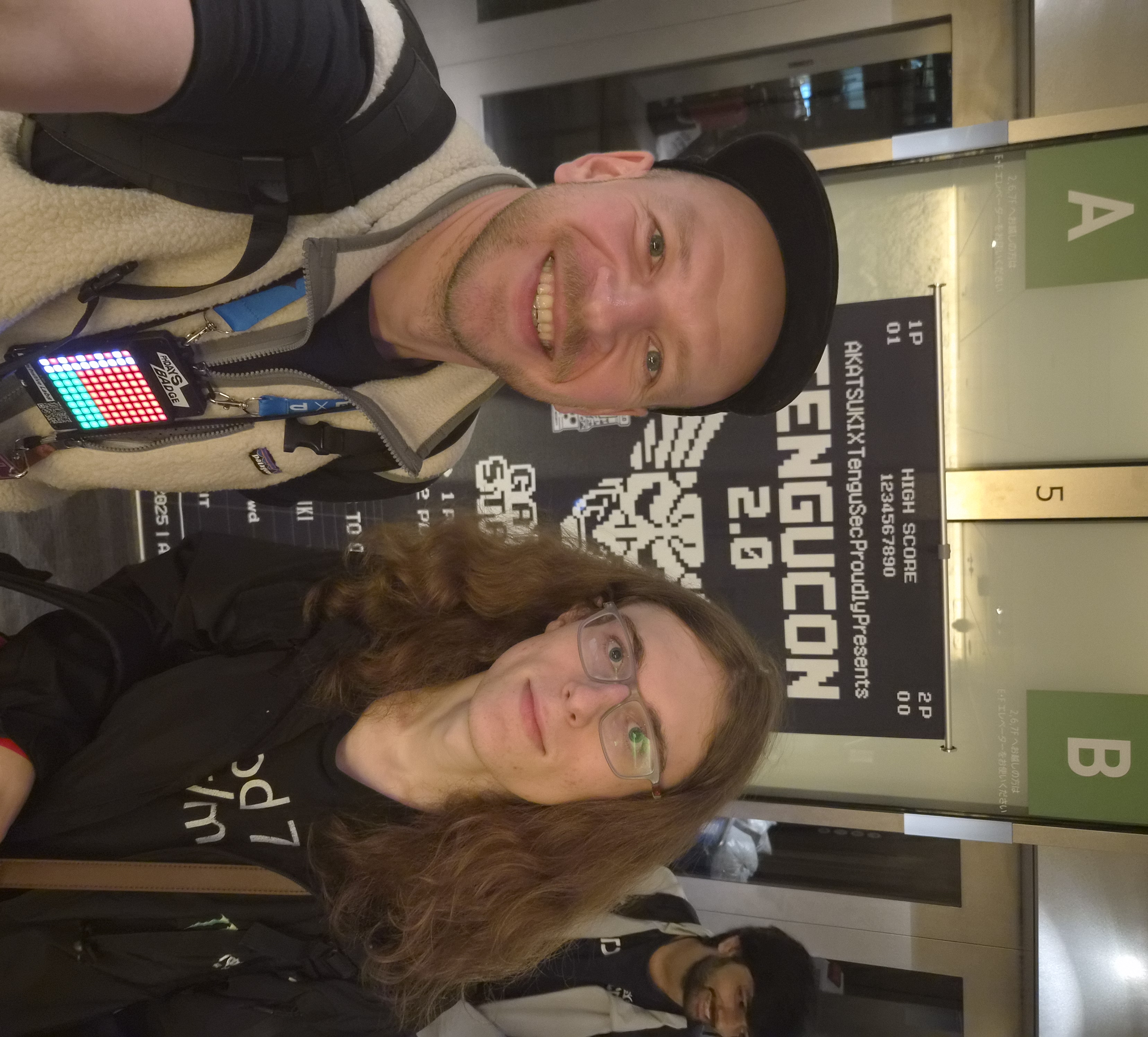 Alex with a community member